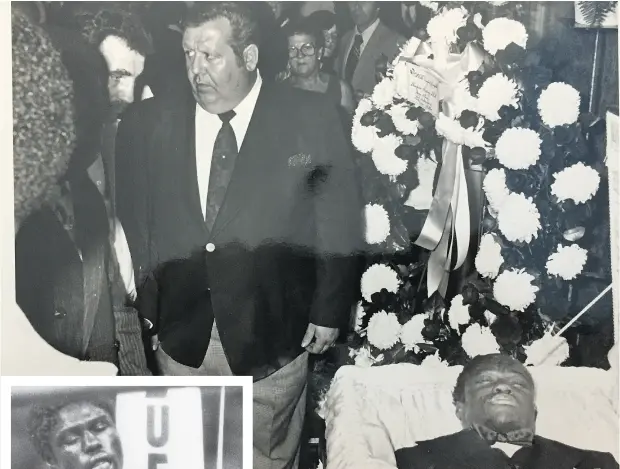  ?? FILES ?? ABOVE: Mourners pay their respects to boxer Cleveland Denny in July 1980. Denny died 16 days after a lightweigh­t title bout against Gaetan Hart. Hart, seen partially obscured at left, retained his title in a split decision and placed the belt in...