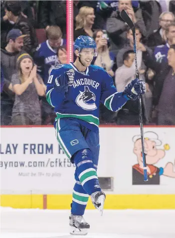  ?? BEN NELMS/ GETTY IMAGES ?? Vancouver Canucks centre Brandon Sutter, seen celebratin­g his shootout winner against the Calgary Flames last Saturday at Rogers Arena, has a goal and three assists in four games.