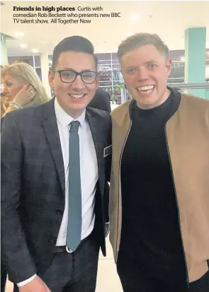  ??  ?? Friends in high places Curtis with comedian Rob Beckett who presents new BBC TV talent show, All Together Now