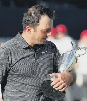  ??  ?? New Open champion Francesco Molinari said he was reluctant to let go of the famous Claret Jug during his night of celebratio­n at Carnoustie following his victory.