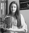  ??  ?? Rosa Maria Paya, daughter of late Cuban dissident Oswaldo Paya, poses for a photo as she holds the Oswaldo Paya Award for Liberty and Life at her home in Havana, Cuba. — Reuters photo