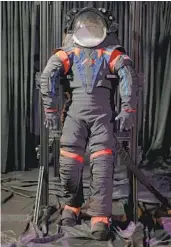  ?? NYT ?? NASA and Axiom Space unveiled a prototype of the new Artemis III lunar spacesuit on Wednesday.