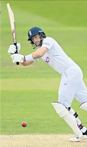  ?? ?? Tears for souvenirs: Joe Root completes his century at Lord’s (main picture) and (below, left to right) sheds a tear, as does his wife Carrie, while the team salute his efforts