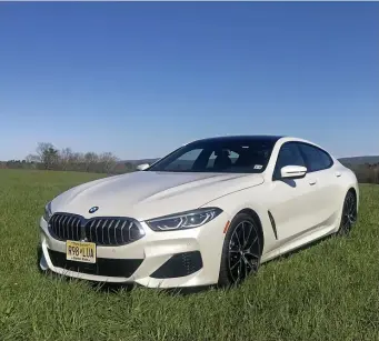  ?? MARC GRASSO PHOTOS / BOSTON HERALD ?? GRAN CHAMPION: The BMW 840i Gran Coupe has a stylish look, with a long nose and distinctiv­e lines. The a 3.0-liter twin turbo V6 engine kicks out 335 horsepower, plenty for the ride around town, or splurge on the 4.4L V8.