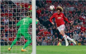  ?? Reuters ?? Marouane Fellaini scores with a classy header as United beat Celta Vigo. —