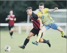  ??  ?? ON TARGET Kian Hampshire, right, netted for Locks Heath in their second successive goal-laden away victory