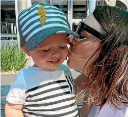  ?? PHOTO: SUPPLIED ?? Perpetual Guardian employee Kirsten Taylor with son Leo on the ‘‘fifth’’ day of her work week.