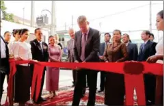  ?? MEAN SANGHA DAVID ?? Scott Neeson, of the Cambodian Children’s Fund, inaugurate­s a stateof-the-art STEM school in Phnom Penh.