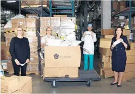  ?? CITY FURNITURE ?? From left, Nicklaus Children’s Hospital’s Carolyn Domina (director, Maternal Fetal Program), Michelle Boggs (president, Nicklaus Children’s Hospital Foundation), Dr. Chad Perlyn (pediatric surgeon) and Perry Ann Reed (hospital president) recieve mask donations.