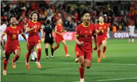  ?? Haiti. Photograph: James Elsby/AP ?? China's Wang Shuang, center, celebrates after scoring the opening goal from the penalty spot during the Women's World Cup Group match against