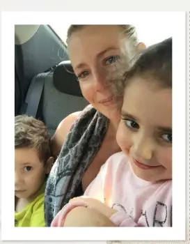  ??  ?? “This photo was taken in the police car on the way to the police station,” says Sally. “I asked them for one quick smile, for a photo to keep in my heart forever. A million tears silently fell down my face as I held Lahela and Noah for the last time,...