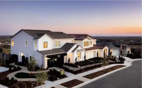  ??  ?? Here are three of the four plans pictured atop the hillside at Iron Ridge. Select from three different exteriors, including California Prairie, Spanish Eclectic or Modern Farmhouse.