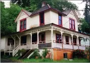  ?? STEPANIE FIRTH - THE ASSOCIATED PRESS ?? The house featured in the Steven Spielberg film “The Goonies” is seen in Astoria, Ore., in 2001. The Victorian home, built in 1896 with sweeping views of the Columbia River as it flows into the Pacific Ocean, is now for sale has been listed with an asking price of $1.7million. Since the film was released in 1985, fans have flocked to the home, and the owner has long complained of constant crowds and trespassin­g.