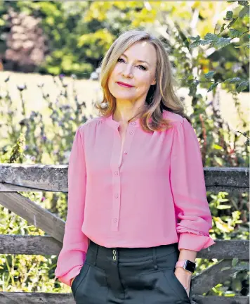  ??  ?? Veteran broadcaste­r: Channel 5 news presenter Sian Williams in the garden of her home in Kent