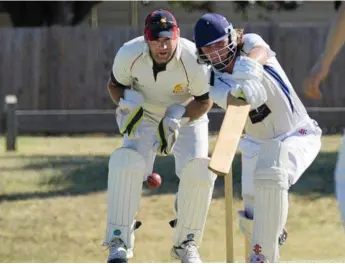  ??  ?? UNBEATEN KNOCK: Tully Willson (pictured batting for University) top scored for Toowoomba with an unbeaten 71.