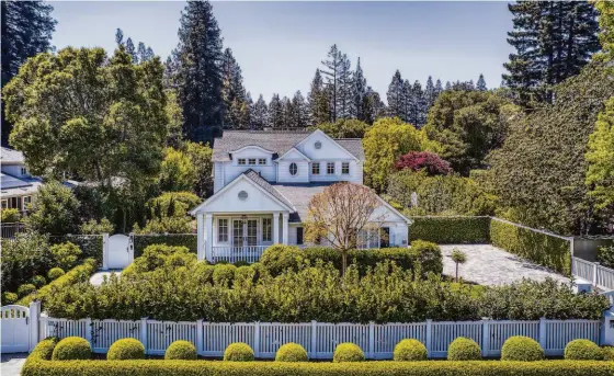  ?? THE AGENCY ?? Above: The Agency represents a vast portfolio of properties, including this four-bedroom home in Atherton with serene gardens and captivatin­g curb appeal. Below: A meandering pathway leads to the front door of this Tuscan-style estate on over 19 acres in Santa Rosa.