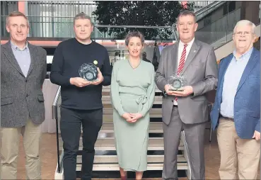  ?? (Pic: Tony O’Connell) ?? Sanctuary Runners, which has now spread nationally and internatio­nally, bring together Irish residents, refugees and asylum seekers to run together to foster solidarity, friendship and respect. Pictured at the award presentati­on for February, were l-r: George Duggan, Cork Crystal; Graham Clifford, Sanctuary Runners founder and Cork Person of the Month; Sandra Carey, Irish Examiner; Paul Moynihan, Cork City Council who accepted the Person of Month award on behalf of his late colleague Tony Power and Manus O’Callaghan, awards organiser.