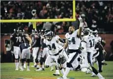  ?? DAVID BANKS/THE ASSOCIATED PRESS ?? The dramatic win by the Philadelph­ia Eagles over the Chicago Bears in the NFC wild-card game last Sunday drew an incredible total audience of 36.4 million in the United States.