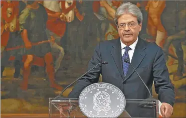  ?? AFP Y CEDOC PERFIL ?? GENTILONI. El nuevo jefe del gobierno tuvo que tomar una decisión que aumenta la deuda pública.