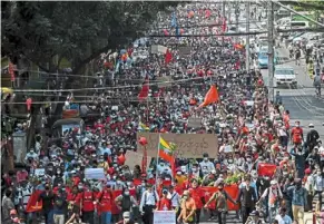  ?? — AFP ?? Out in force: A file photo showing protesters at a demonstrat­ion against the military coup in Yangon. The country has been in turmoil since the army ousted Suu Kyi in February.