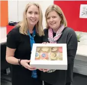  ??  ?? Sue Griggs won the raffle of a box of cupcakes at First National Candappa’s Biggest Morning Tea.