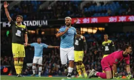  ??  ?? Sergio Agüero celebrates scoring Manchester City’s third goal, and his second, against Southampto­n. Photograph: Victoria Haydn/Manchester City FC via Getty Images