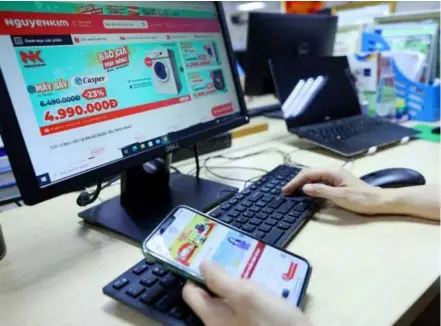  ?? VNA/VNS Photo Phạm Hậu ?? The rapid developmen­t of the digital economy, especially e-commerce, has posed risks to tax management.