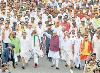  ??  ?? BJP president Amit Shah leads a march in Kerala’s Thiruvanan­thapuram. In his speeches in the southern state, the 52yearold leader has vowed to oust the Left from its bastion, encapsulat­ing party’s efforts to expand across the country. HT FILE/VIVEK NAIR