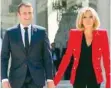  ?? — AFP ?? This file photo taken on July 6, 2017 shows Macron and his wife Brigitte at the Elysee Palace in Paris.