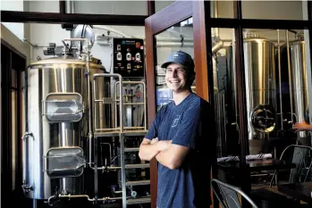  ??  ?? Head brewer J.C. Hill, above, owns Alvarado Street Brewery & Grill along with his dad. He’s already crafted 30 house beers. Left: the Hawaiian-style comfort load of loco moco.