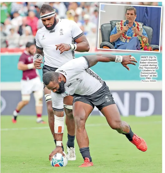  ?? Picture: JOVESA NAISUA Picture: RAMA ?? INSET: Fiji 7s coach Gareth Baber stresses a point during the “Successful Leaders in Conversati­on Series” at the FNU.
Semi Radradra scores a try as Semi Kunatani closes in against Georgia at the Hanazono Rugby Stadium in Hanazono, Osaka.