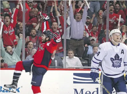  ?? PATRICK SMITH/GETTY IMAGES ?? Tom Wilson and Washington Capitals fans were in a celebrator­y mood following a 3-2 overtime victory Thursday night.