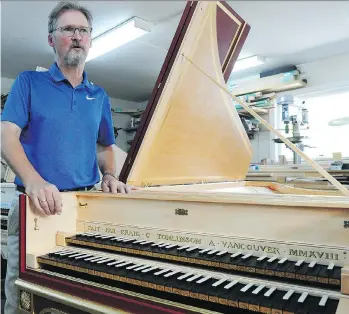  ?? NICK PROCAYLO ?? Instrument maker Craig Tomlinson says it take him about 1,000 to 1,200 hours to build a harpsichor­d, and 1,500 to 1,700 hours to make a fortepiano, crafted in the style of 17th- to early 19th-century pianos.