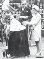  ?? AFP/ GETTY IMAGES ?? Queen Elizabeth II and her 20- year- old son during the traditiona­l ceremony for his investitur­e as Prince of Wales in 1969.