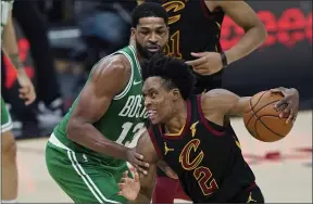  ?? TONY DEJAK — THE ASSOCIATED PRESS ?? Collin Sexton drives against the Celtics’ Tristan Thompson during the second half May 12 in Cleveland.