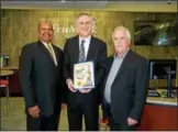  ?? SUBMITTED PHOTO ?? Attending Friday’s ribbon-cutting ceremony at TruMark Financial’s Downingtow­n branch are State Rep. Harry Lewis Jr., TruMark CEO Richard Stipa and Board President Hugh Bray.