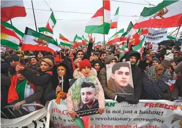  ?? AFP ?? People take part in a rally against the Iranian regime in front of the European Parliament in Strasbourg, eastern France yesterday. Iran said on January 14 it had executed a British-Iranian dual national sentenced to death for spying for the United Kingdom.
