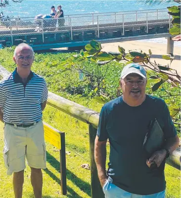  ??  ?? YEAR-ROUND ATTRACTION: Clive Abbott (left) and Tony Richards have been pushing for a safe harbour project in Palm Cove, which would also include fishing pontoons and a swimming lagoon.