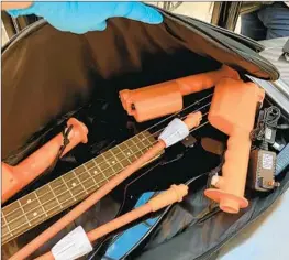  ?? AMONG THE TOP Transporta­tion Security Administra­tion ?? finds of 2022: three cattle prods stuffed into a guitar case.