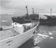  ?? AFP / GETTY IMAGES ?? Japanese whaling ship Kaiko Maru, left, and the Farley Mowat protest boat, centre, in Antarctic waters in 2007.