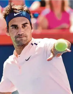  ?? AFP PIC ?? Roger Federer in action against Peter Polansky in the Rogers Cup in Montreal on Wednesday.