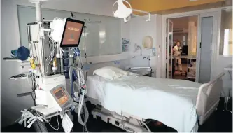  ??  ?? A BED in the intensive care unit of a hospital in Vannes, France, used for coronaviru­s patients.
| STEPHANE MAHE Reuters