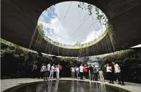  ?? ST PHOTO:
WONG PEI TING ?? The Japanese Garden will feature a gorge-like landscape called the Sunken Garden, where walled paths lead parkgoers to a centrepiec­e (left) that takes inspiratio­n from a collapsed limestone cave formation.