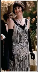  ?? ?? ABBEY HABIT: Michelle Dockery in a flapper dress as Lady Mary in Downton