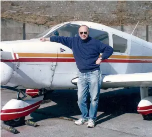  ??  ?? Dave with his beloved Cherokee in its “parking spot,” a bomber revetment.