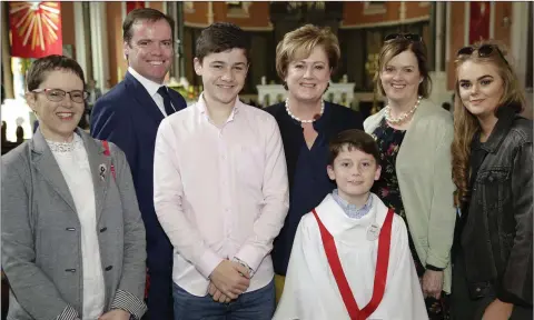  ??  ?? Robert Munro on the occasion of his Confirmati­on in the Holy Redeemer church , with Niamh, Andy, Daniel and Annmarie Munro and Caroline and Aoife Edwards.