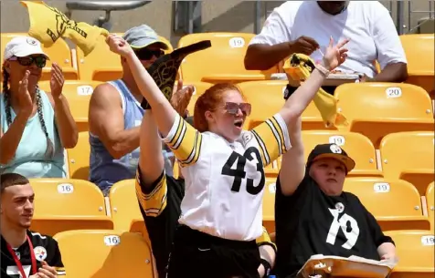  ?? Matt Freed/Post-Gazette photos ?? This fan was so excited to be back she didn’t care that it was only July 28.