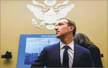  ?? Andrew Harnik Associated Press ?? A FACEBOOK spokesman said the company is investing billions of dollars to fight hate and misinforma­tion on its platform. Above, Facebook CEO Mark Zuckerberg arrives to testify on Capitol Hill last year.