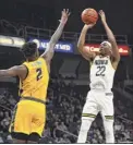  ?? Lori Van Buren / Times Union ?? Jalen Pickett (22) and Siena will try again to play Canisius, tentativel­y on Dec. 26 and 27.