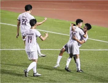  ?? (UAAP Media photo)* ?? The University of the Philippine­s Fighting Maroons celebrate Cian Galsim’s goal against Ateneo de Manila University in the UAAP Season 86 men’s football tournament on Thursday, April 18, 2024.